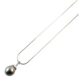 Tahitian pearl and diamond set white gold pendant and chain , the pear shaped black Tahitian pearl