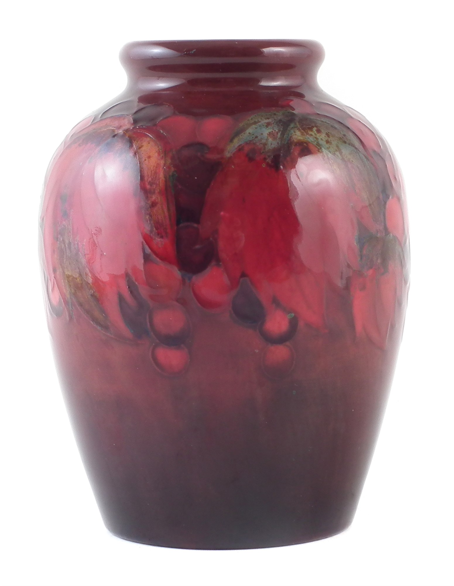 Moorcroft flambe vase , decorated with leaves and berries pattern, impressed William Moorcroft and