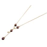 18ct gold chocolate coloured Tahitian pearl and diamond drop pendant and chain , four chocolate