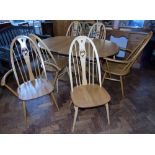Ercol extending dining table and six chairs (two carvers). Condition reports are not available for