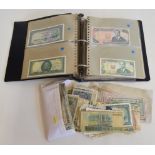 World banknote collection contained within one album with a selection of loose notes.