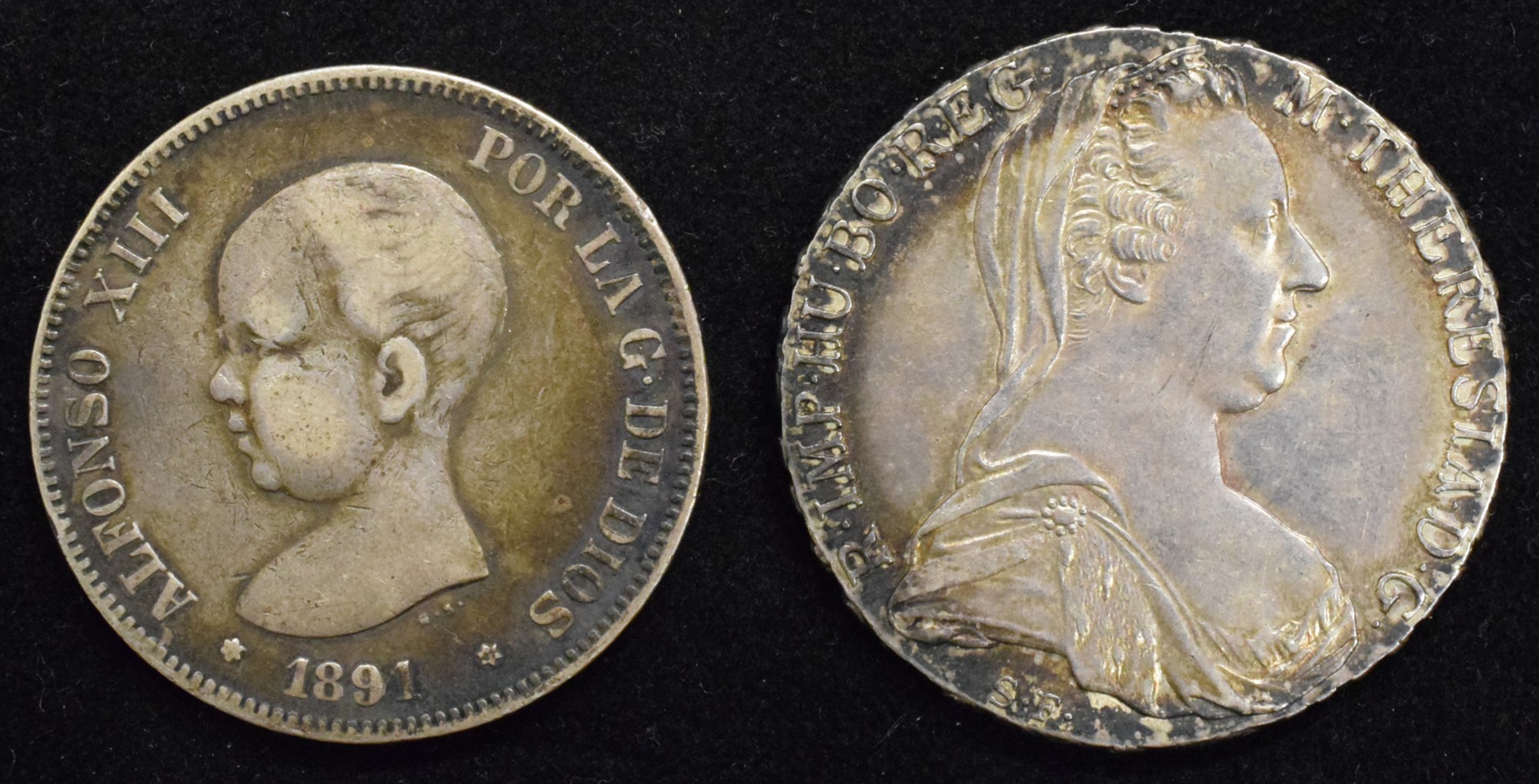 Austrian silver coin and Spanish silver coin (2).