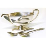 Art Deco silver sauceboat and two spoons. Condition reports are not available for the Interiors