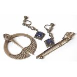 Celtic silver brooch, silver sword brooch and a pair of silver drop earrings Condition reports are