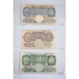 Two albums of British banknotes.