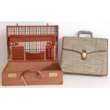 Leather Burberry briefcase with combination locks and smaller unmarked ditto. Condition reports