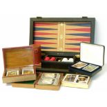 Backgammon set, various boxes of cards. Condition reports are not available for the Interiors Sale.