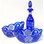 Three piece Cobalt blue cut glass.Condition reports are not available for the Interiors Sale.