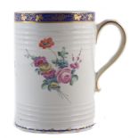 Derby mug circa 1780, with fluted body painted with flower sprays, puce mark without batons to base,