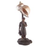 Early 20th century Art Nouveau bronze table lamp in the form of a Dutch boy smoking a cigarillo