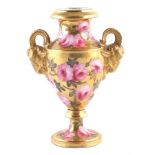 English porcelain twin handled vase possibly Derby, finely painted with roses on a gilt ground, with