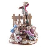 Meissen figure group of the wine press, decorated with various inebriated children around the press,