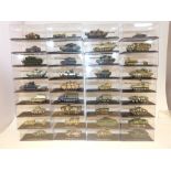 Thirty six Deagostini cased models of various military vehicles Condition reports are not