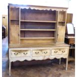 George III pine dresser with three drawers to base, complete with plate rack enclosing cupboard