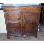 George III oak two door cabinet. Condition reports are not available for our Interiors Sale.