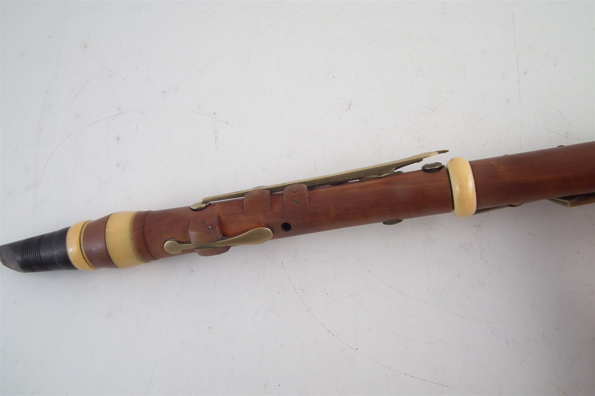 Boxwood and ivory clarinet by Bilton, stamped with 93 Westminster Bridge Road London address, with - Image 7 of 9