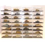 Thirty two Deagostini cased models of mainly German WWII tanks and troop carriers Condition