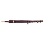 Rosewood flageolet, fitted with four keys and bone mouth piece, 37.5cm long