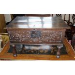 17th century oak bible box with carved panels to front and sides on later turned legs 64 X 41cm