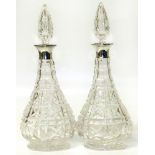 Pair of Silver mounted decanters and stoppers, Sheffield 1937, Condition reports are not available