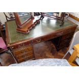 Reproduction mahogany twin-pedestal desk enclosing nine drawers with inset leather top 153cm x