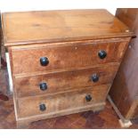 Victorian pine chest of three graduated drawers, 59cm wide. Condition reports are not available