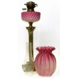 Victorian brass oil lamp with ruby glass shade Condition reports are not available for our Interiors