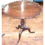 George III mahogany tripod table with pie-crust top on later base, 58cm diameter. Condition