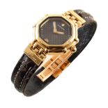 Gerald Genta lady's 18ct yellow gold watch on leather strap , octagonal black dial with date