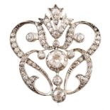 Circa 1900 diamond garland brooch , the Art Nouveau style open work design with central round old