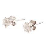 Pair of diamond solitaire 18ct white gold stud earrings , two round brilliant cut diamonds