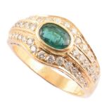 Emerald single stone and diamond set 18ct gold ring , the central oval faceted emerald approx 0.