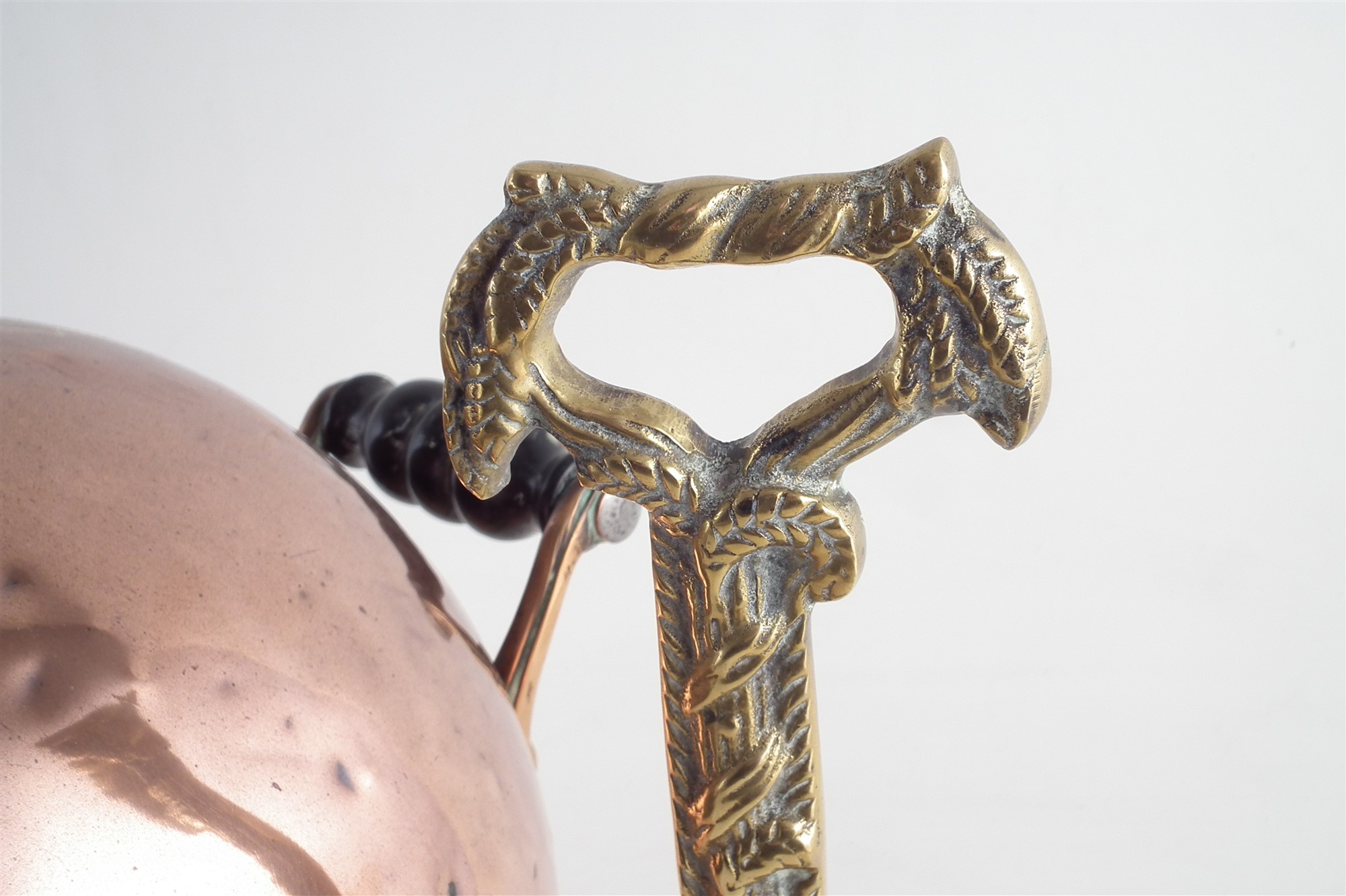 Mid 19th century copper coal helmet, strap-work handles with turned ebonised grip, circular foot - Image 3 of 8