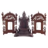Pair of Chinese carved frames and a Burmese hardwood stand, 27cm high Condition reports are not