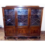 Early 20th century mahogany cabinet with three astragal glazed doors to upper portion, three