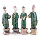 Four Chinese Sancai tomb figures 37cm high Condition reports are not available for this auction