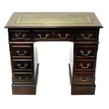 Reproduction twin-pedestal desk complete with inset leather top 93cm x 53cm Condition reports are