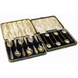 Two sets of silver teaspoons, one set by Emile Viner, Chester, boxed and one other boxed set