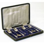 A set of six boxed silver teaspoons and a pair of silver sugar tongs Condition reports are not