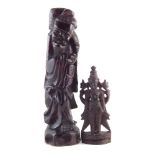 Carved Chinese hardwood figure and one other, the largest measures 42cm the smaller figure 24cm.