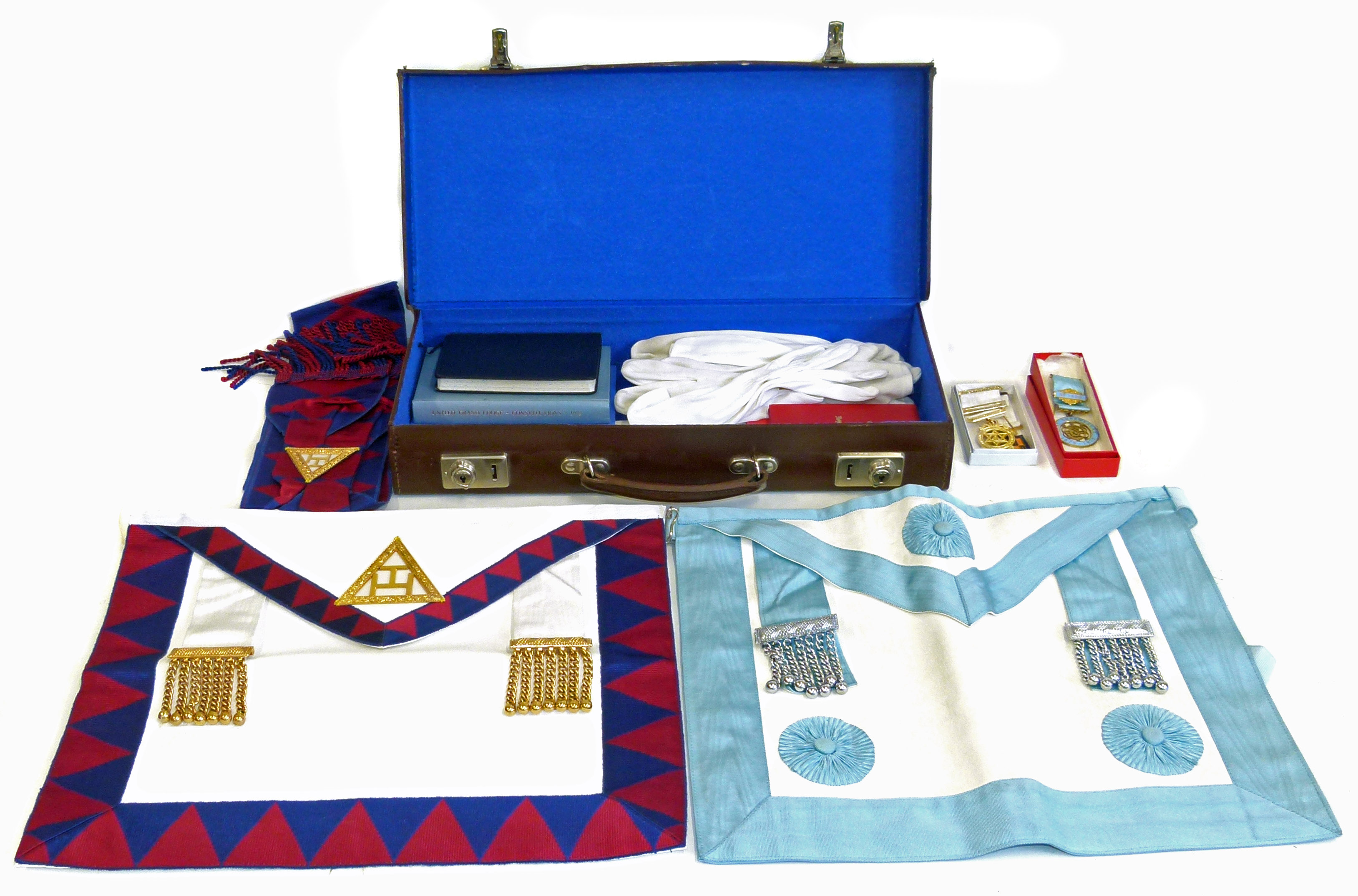 A leather case containing two Masonic aprons, sash etc Condition reports are not available for