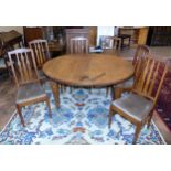 Oval oak late 19th century wind-out dining table on taper legs, 145 x 120cm complete with two