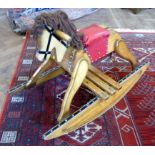 Mid 20th century pine rocking horse, 97cm long. Condition reports are not available for this