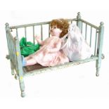 Cinderella No.4 doll complete with various clothing, bedding and cot Condition reports are not