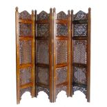 Indian teak and brass inlaid four-division screen Condition reports are not available for this