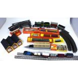 Unboxed Hornby type 30 clockwork loco, Tender and two wagons (45746) and a quantity of track, Hornby