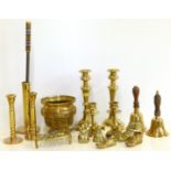 Three bairs of lass candlesticks, brass trivet, two brass bells Condition reports are not