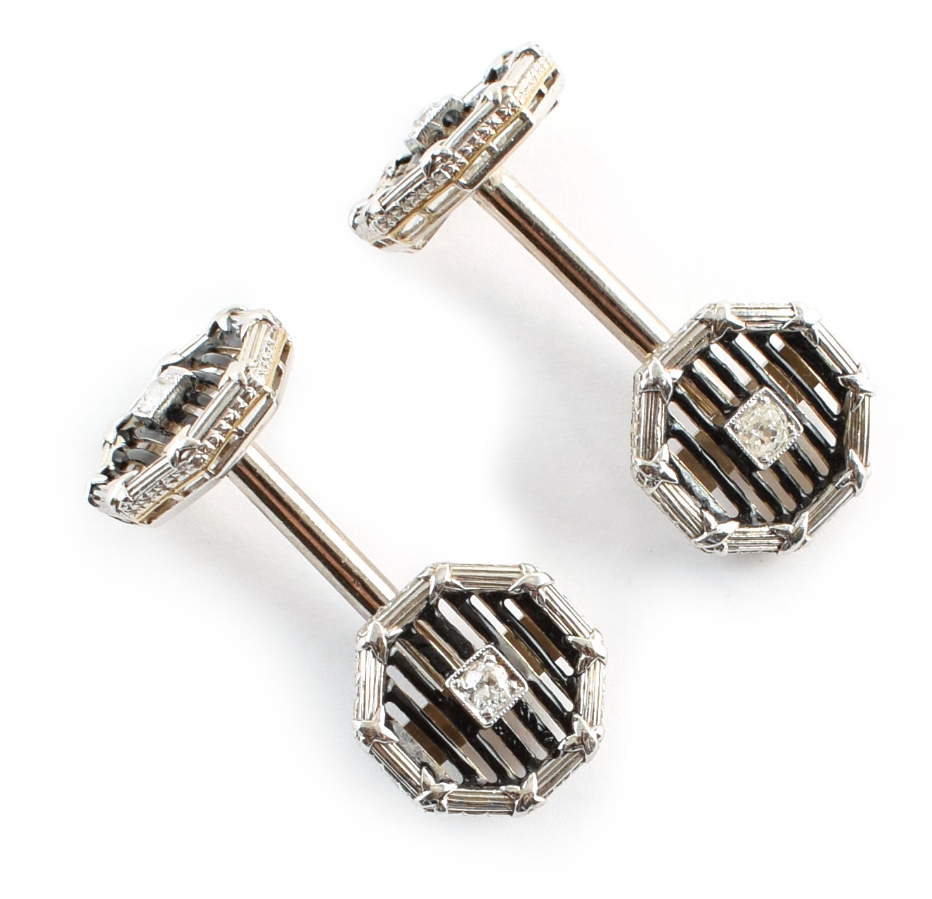 Pair of Art Deco design gent's diamond and black enamelled platinum cufflinks