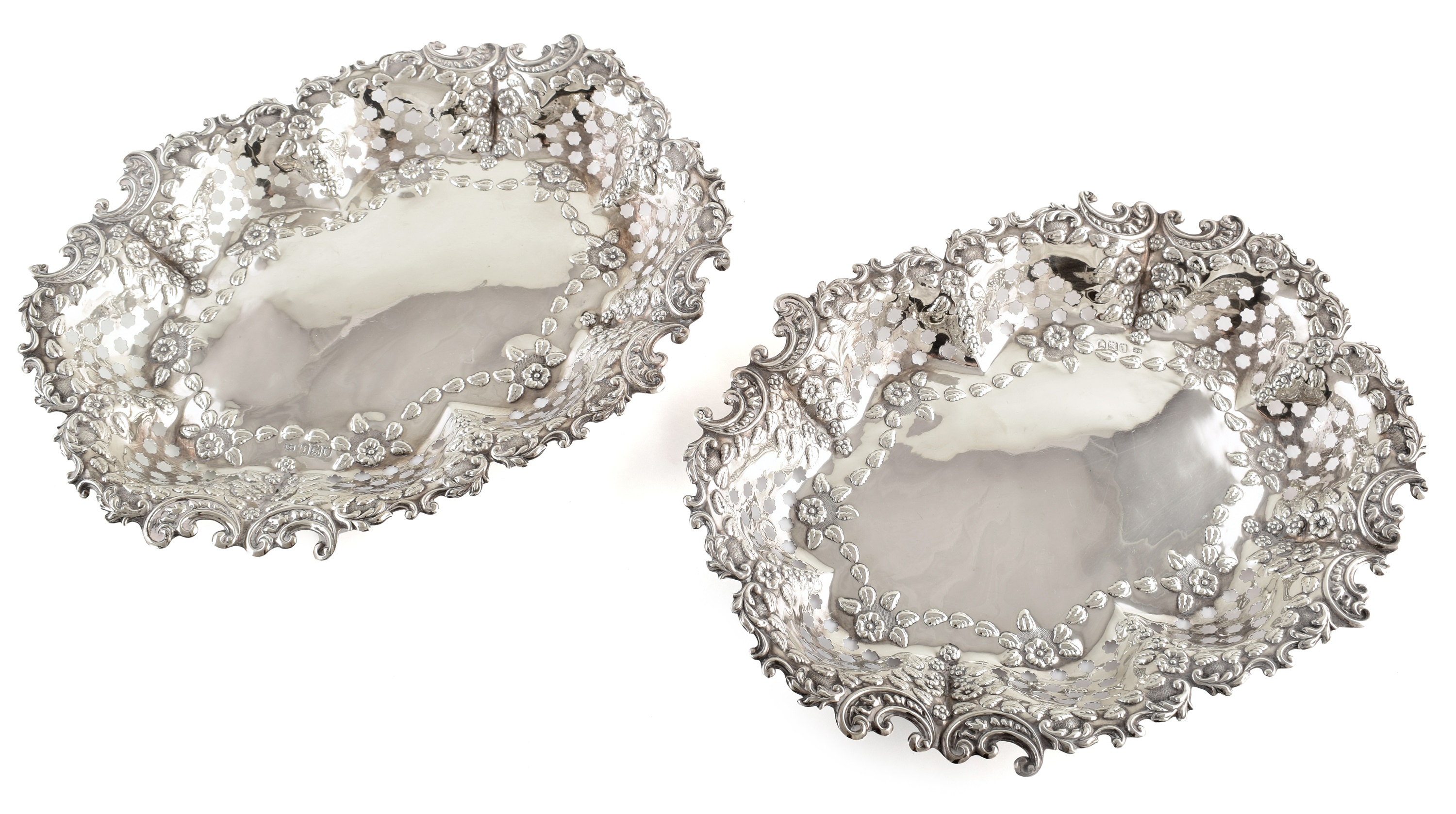 Pair of silver dishes of oval shape