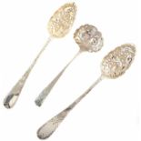 Pair of Scottish silver berry spoons and a George III silver sugar ladle